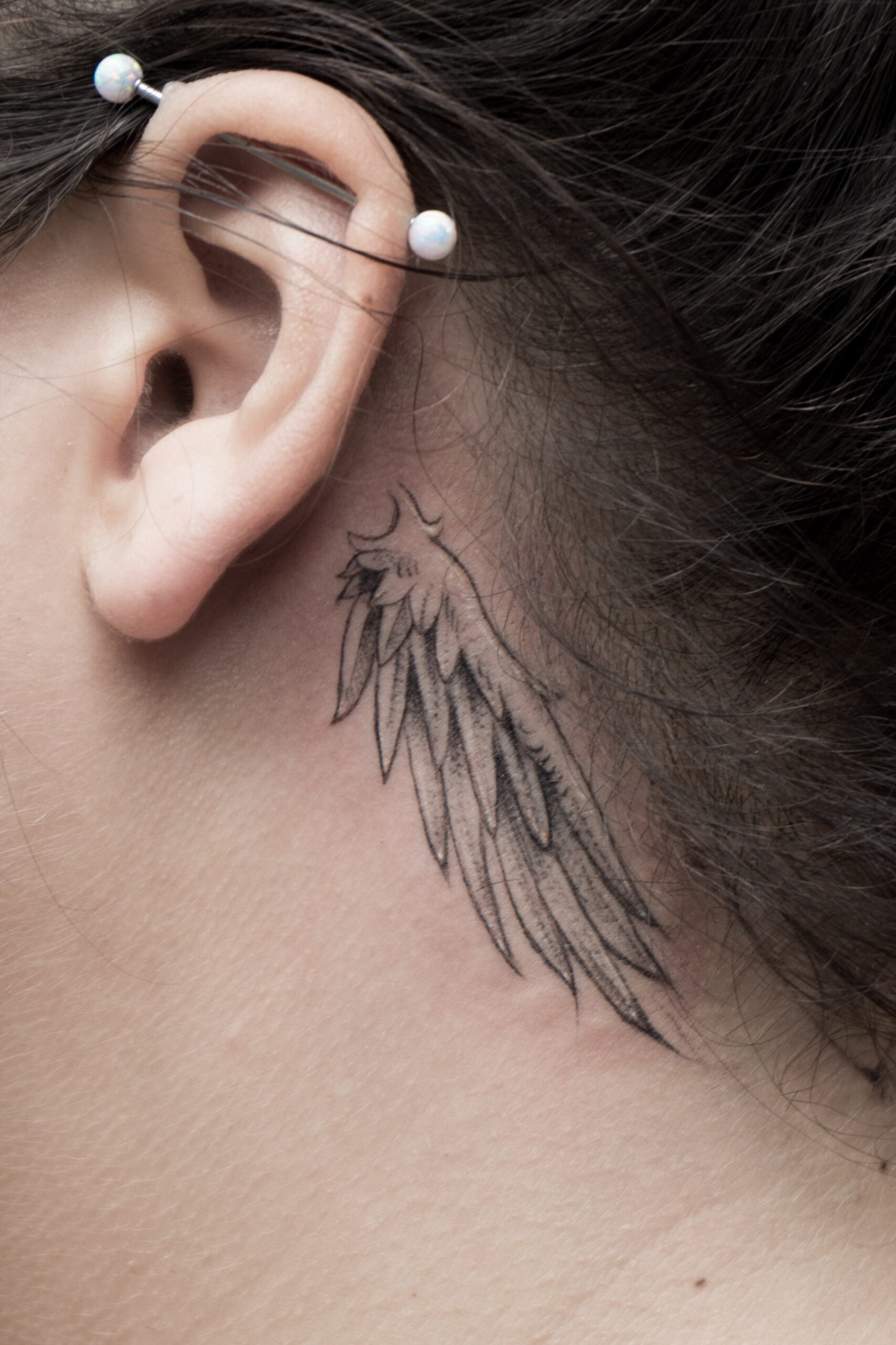 Angel Wings Tattoo Behind the Ear